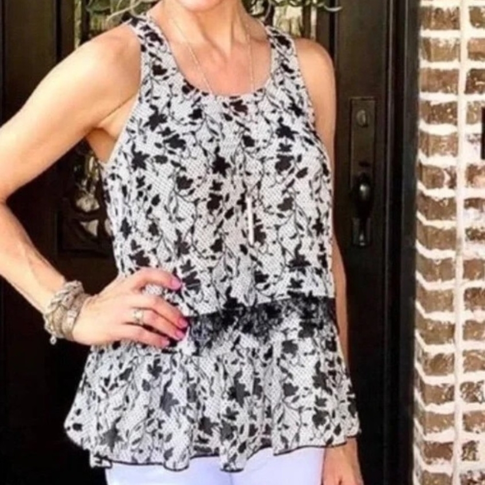 CAbi Black and White Floral Lace Peplum Top. Size M
